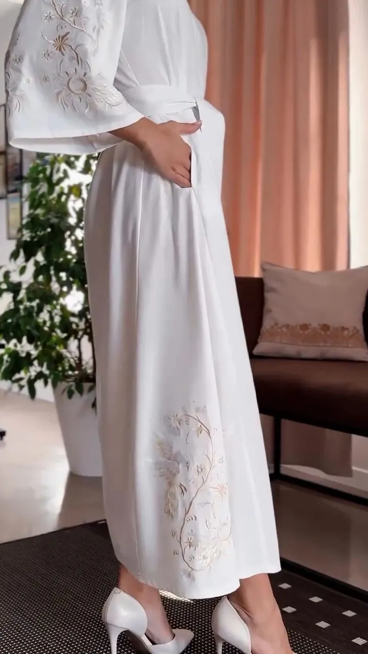 Elegant Ukrainian linen dress with embroidery